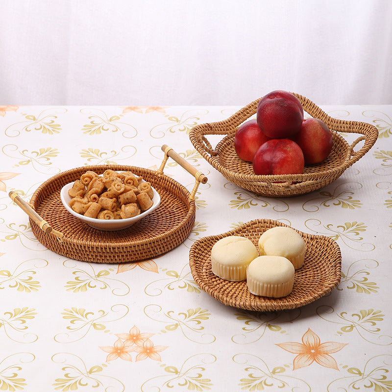 Wicker baskets with snacks on a decorative tablecloth