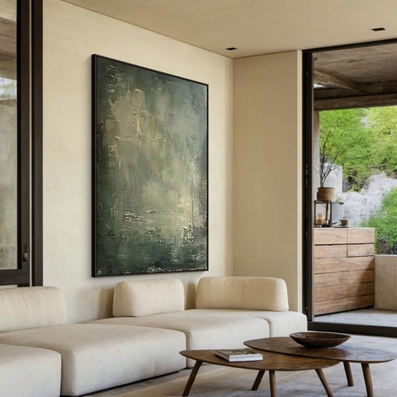 Modern living room with a large abstract painting on the wall, beige sofa, and wooden coffee table.