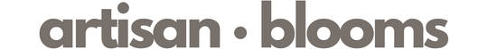 Logo of 'artisan•blooms' on a white background